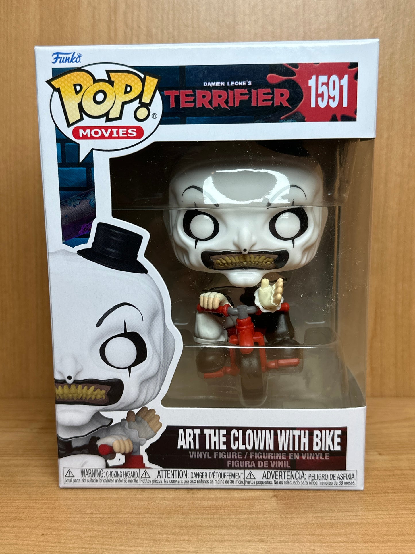 Funko Art the Clown from the terrifier on a bike