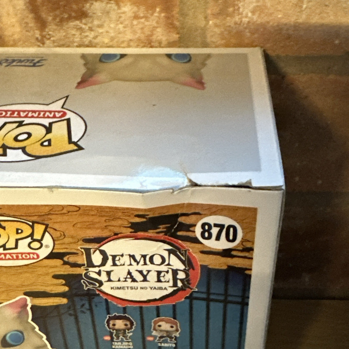 Demon Slayer Inosuke Hashibira with Blades Crossed Flocked Pop! Vinyl Box Damage3