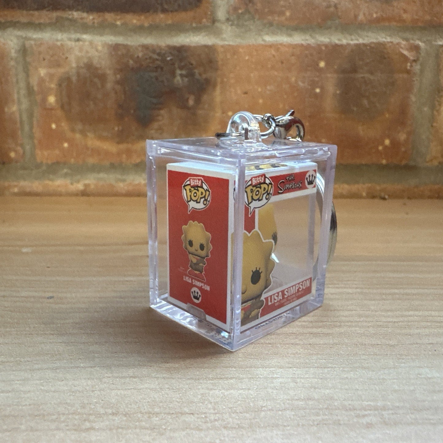 Funko Bitty Pop! The Simpsons Lisa  Saxophone Chase Hard Case Key ring Set