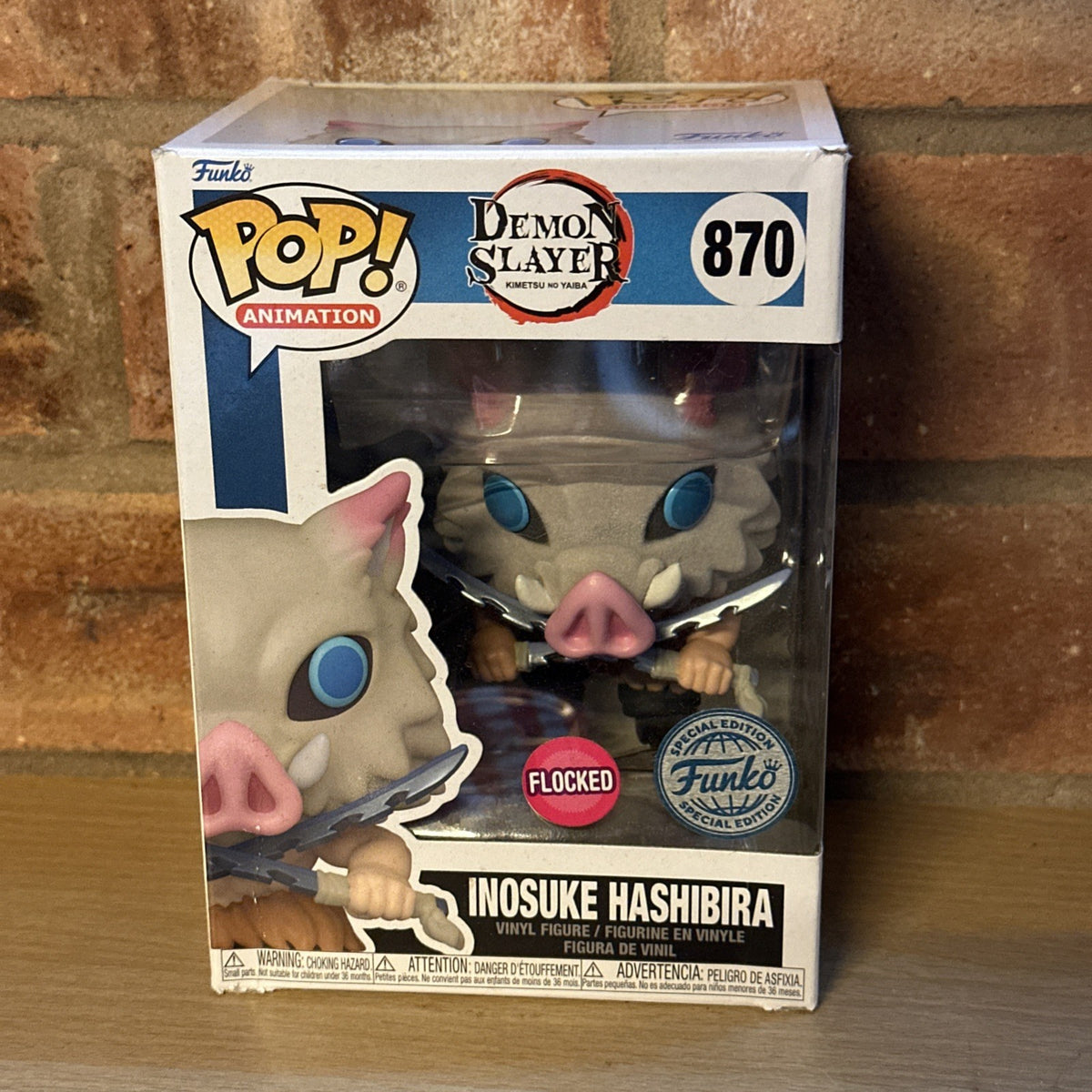 funko Demon Slayer - Inosuke Hashibira with Blades Crossed Flocked Pop!1