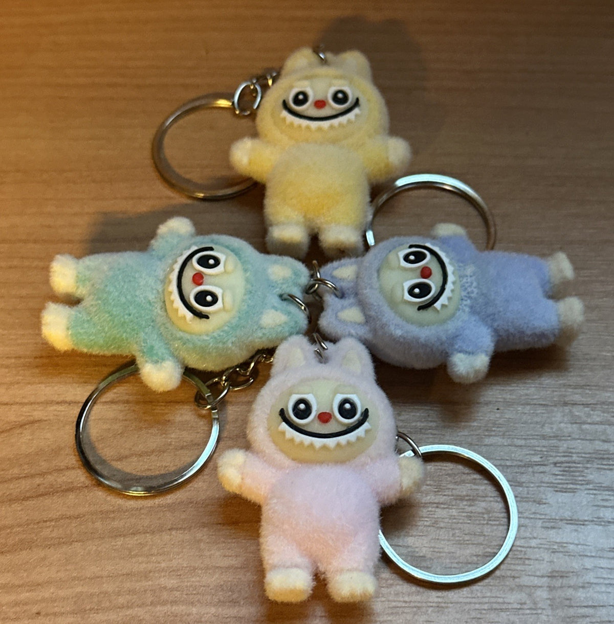 4 X  little monster Flocked Mini Keychain Bag Car KeyChain Pendant Keyring0