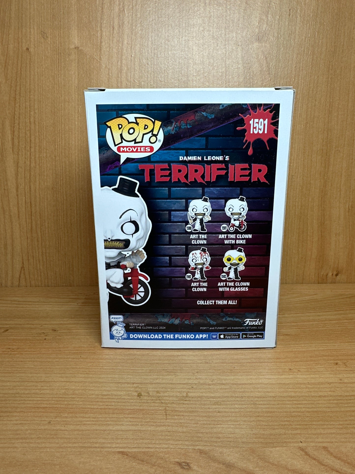 Funko Art the Clown from the terrifier on a bike